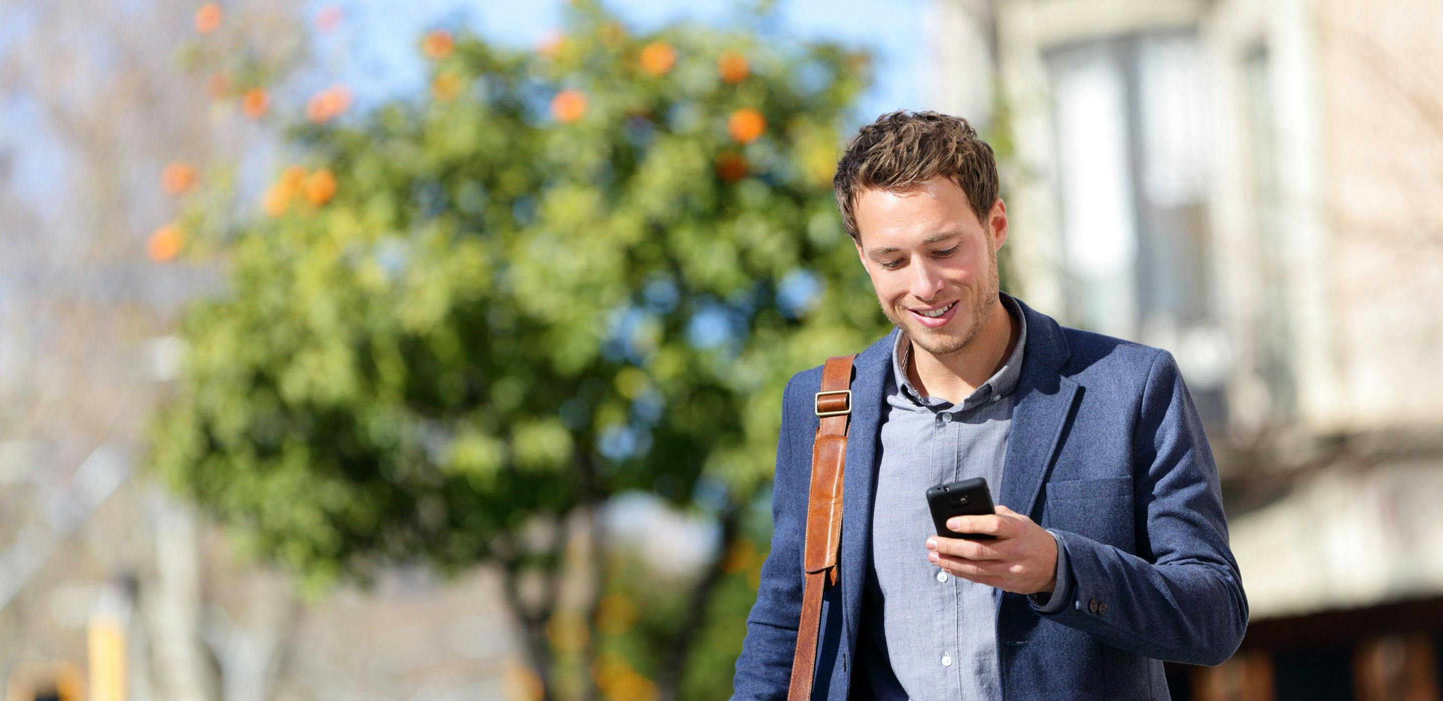 Smiling man walking