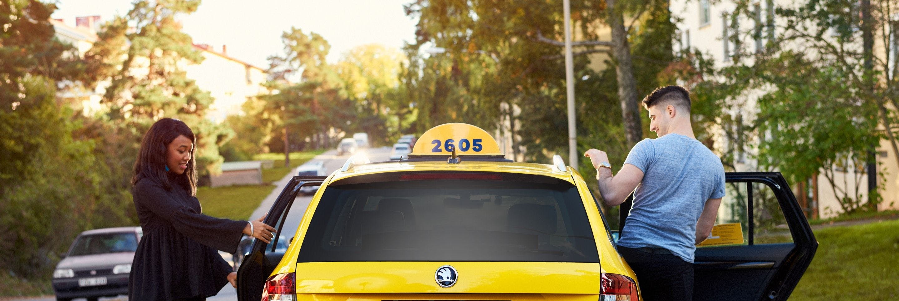 Woman and man taking a cab